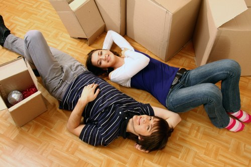 Local moving team handling boxes and household items